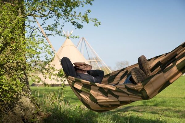 Tentipi Hammock with Tipi Tent in the back ground