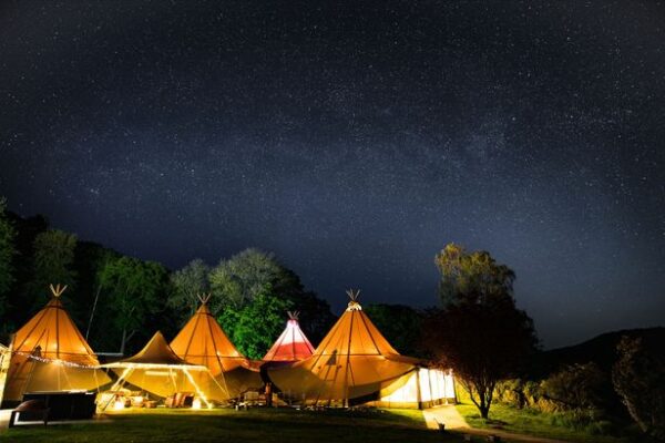 Tipis under a starry sky, in the Lake District wedding venue, Silverholme Manor. Weddings at Silverholme.
