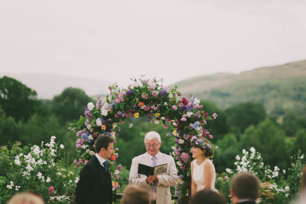 Outside Wedding Ceremony Casterton. Wedding Florist - floral Wedding Arch. Floral Wedding Crown Wedding Celebrant Cumbria, Lake District