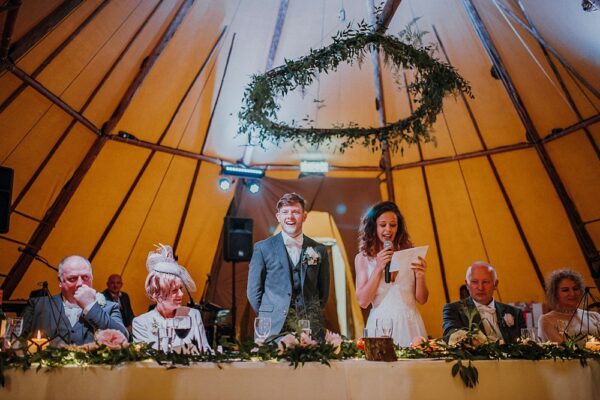 Wedding Speeches in the tipi tent, tipi hire cumbria interior styling