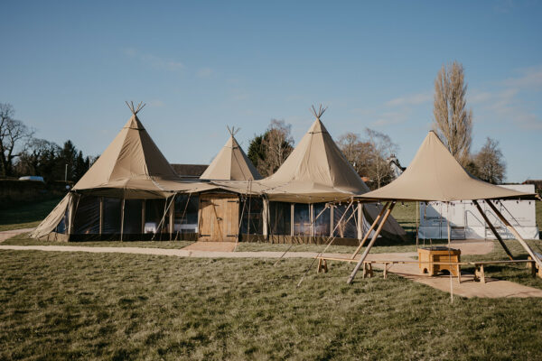 Tipi Tent with Clear Panels and Oak Doors with a Baby Nimbus Tipi and Event Loo Hire