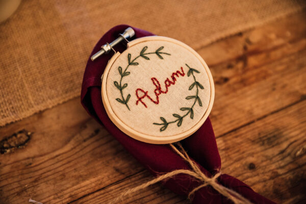 Homemade, embroidered sustainable wedding favour, place setting