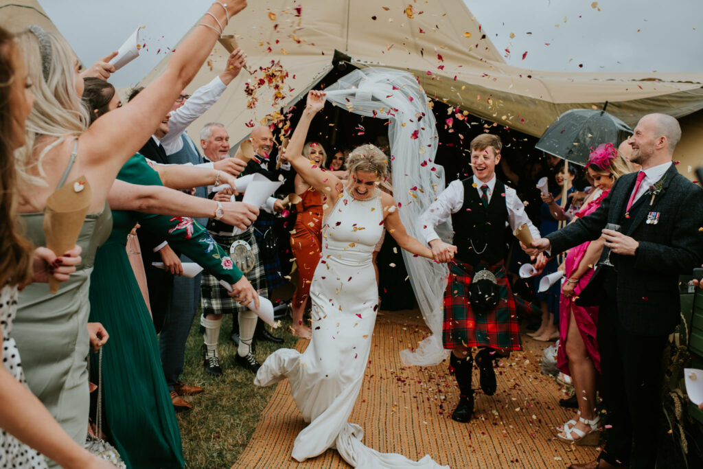 couple with confetti - natural confetti - tipi wedding - tipi wedding scotland