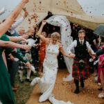 couple with confetti - natural confetti - tipi wedding - tipi wedding scotland