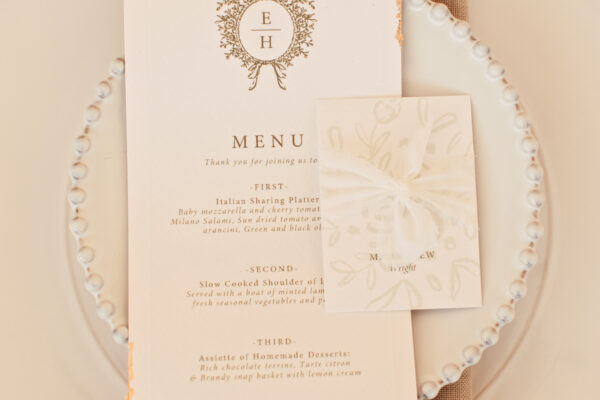 Wedding menu - wedding catering - Charger plate and neutral coloured napkins