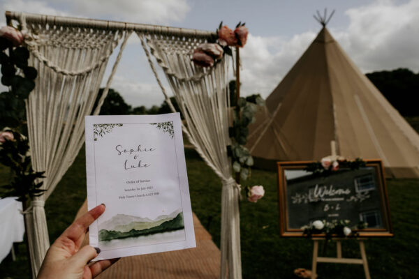 Wedding decor inspiration for tipi wedding in the lake district, gorgeous macrame archway and mirrored wedding sign. Gorgeous wedding stationary ideas