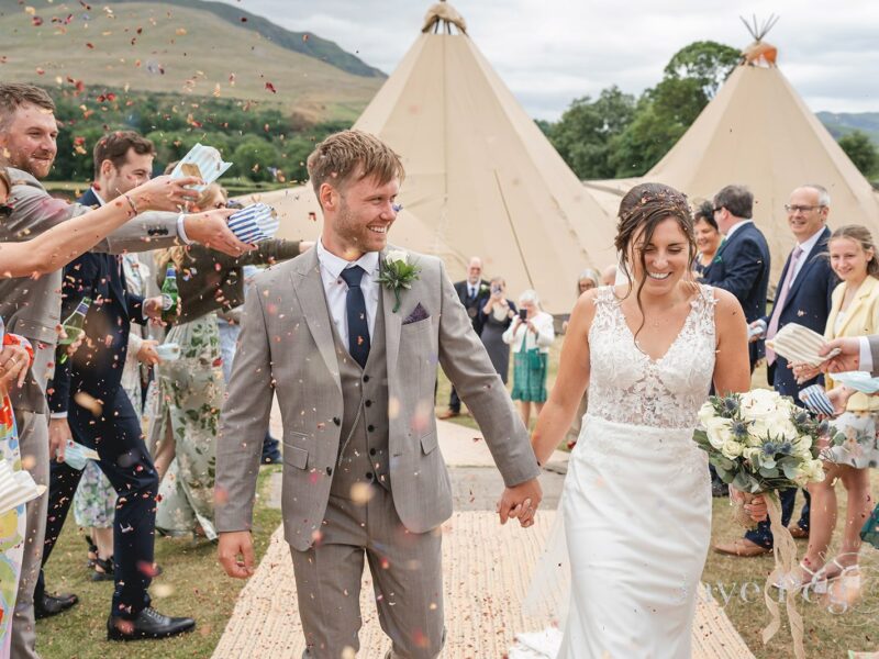 Happy Couple at Threlkeld Cricket Club in the Lake District Tipi Tent Friendly Wedding Venue