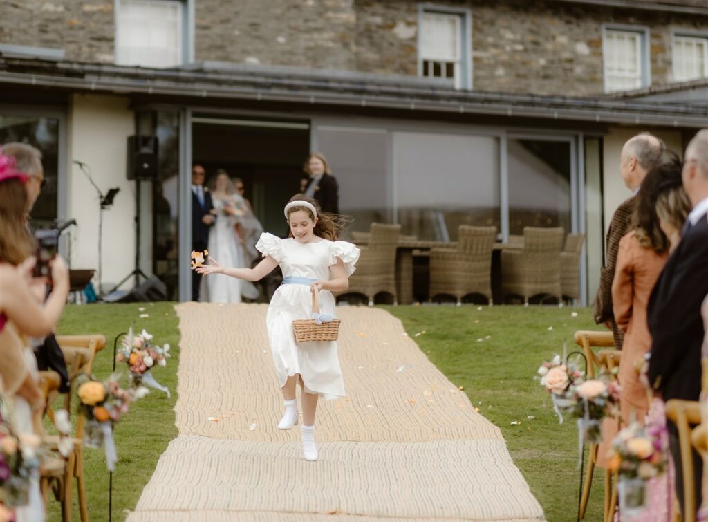 Outdoor Ceremony with Matted Walkway, the perfect wedding runway for the flower girl!