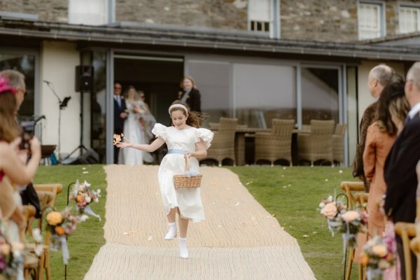 Outdoor Ceremony with Matted Walkway, the perfect wedding runway for the flower girl!