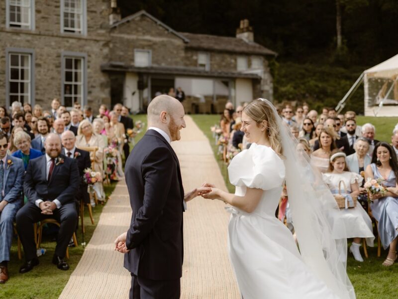 Exchanging of Wedding Rings - Outdoor Wedding Ceremony for Sailcloth Marquee, Lake District Wedding