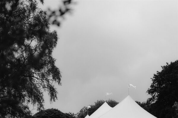 Tent Wedding in the Lake District Wedding with Sailcloth Marquee flags flying high
