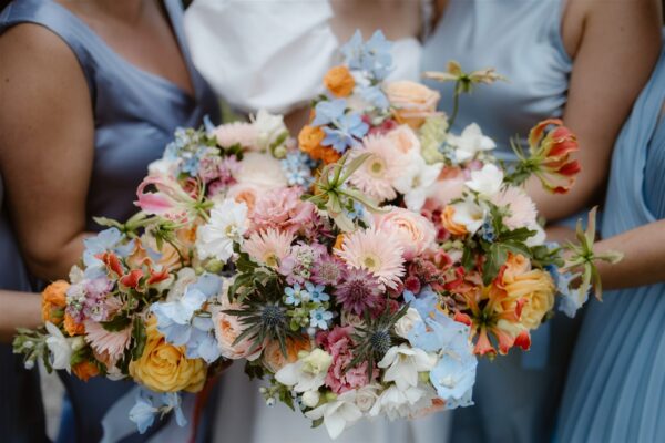 Beautiful Wedding Bouquets and bridesmaids wedding dresses - Sailcloth Marquee wedding in the lake district - Sailcloth Tent Wedding Hire Cumbria